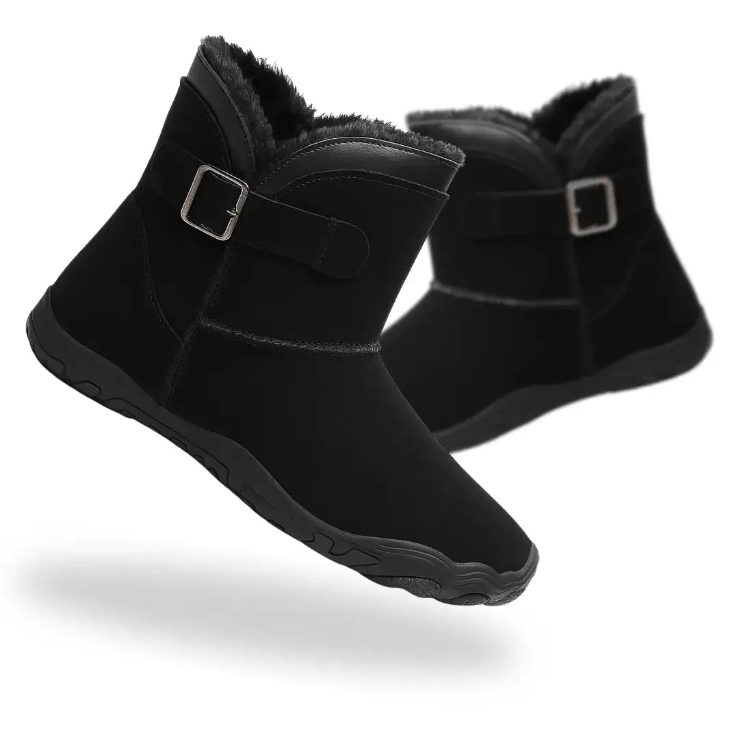 Black Huggers barefoot winter boots with minimalist foot-shaped design