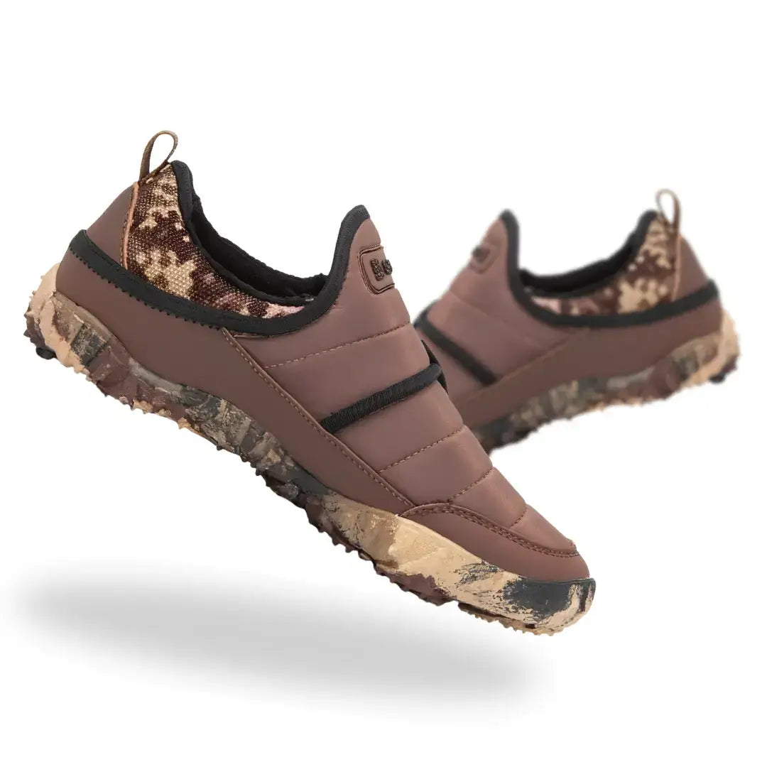 Brown Sledders barefoot snow shoes with zero drop design and flexible sole