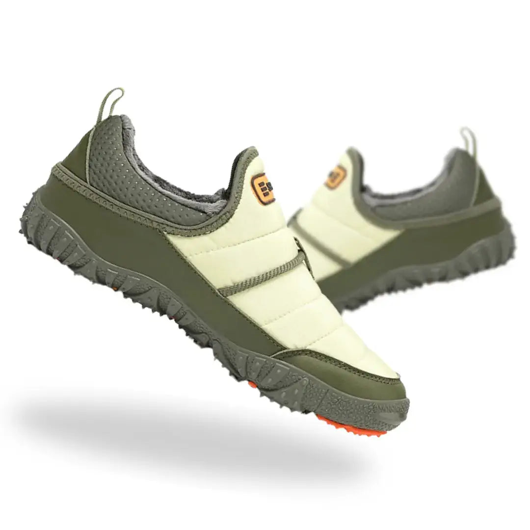 Green Sledders barefoot snow shoes with wide toe box and non-slip outsole