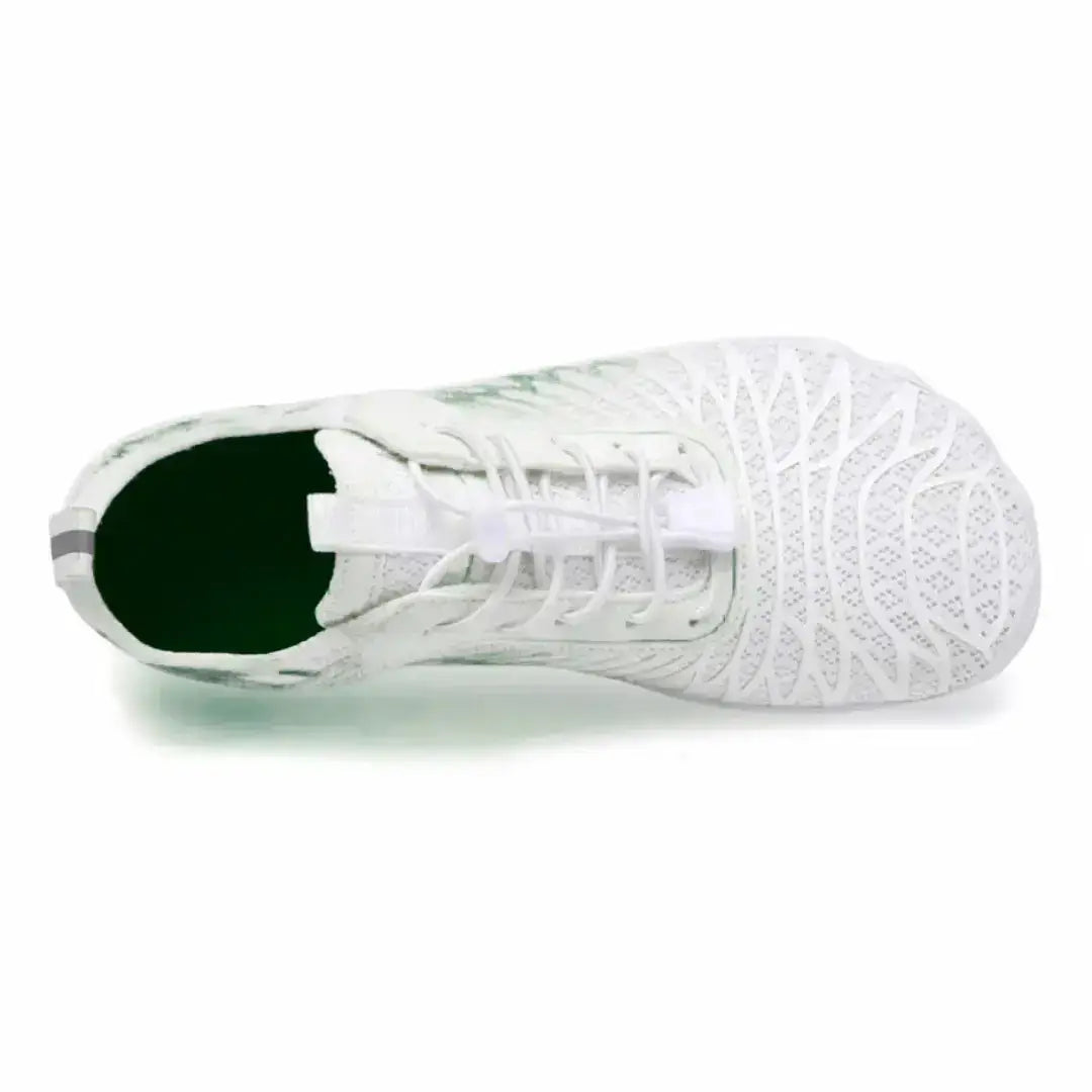 Green Gossamers barefoot shoes top view highlighting foot-shaped fit